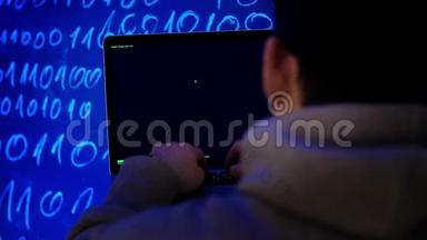 网络犯罪黑客技术概念。 黑客在暗室编写编程代码或使用病毒程序进行网络攻击。